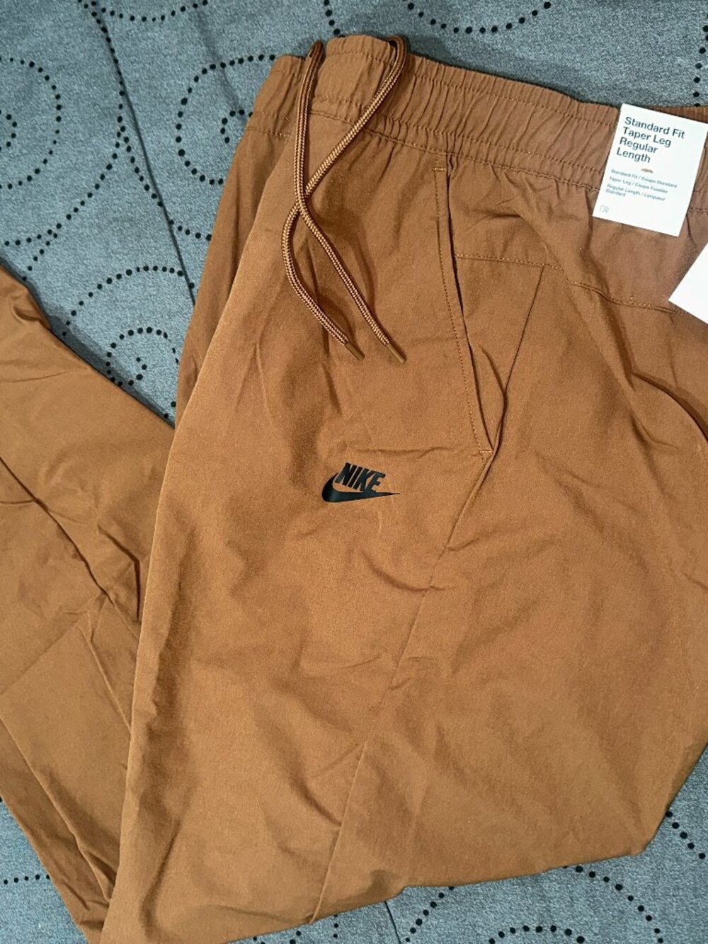 NIKE NWS WOVEN OH COMMUTE UNLINED #281 TAN CAMEL TAPER PANTS SIZE XL MEN NWT $80